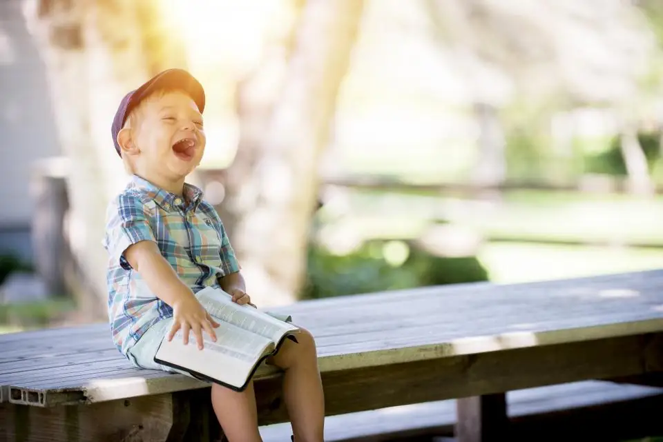 A young child laughing