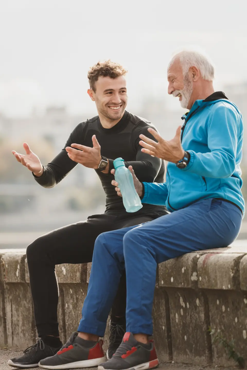 Two men talking together outdoors